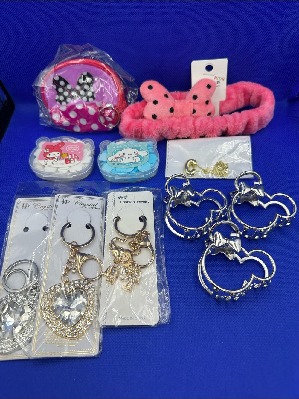 Assortment of Kids Hair Accessories, Keychains, Paper Soaps, Necklace and Pouch